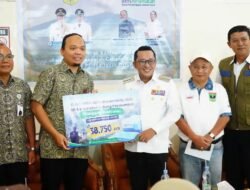 Kiriman Kabut Asap Kembali Datang, BPJS Kesehatan Serahkan 38.750 Masker untuk Tanah Datar